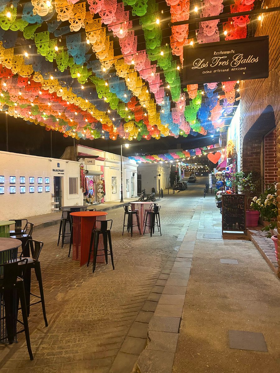 Los Tres Gallos restaurant street decorated with papel picado